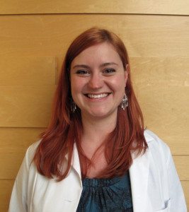 Kristin-Mussar in a labcoat